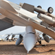 Illustration for article titled Massive Storm Tosses Jets At Air Force Boneyard Around Like Toys